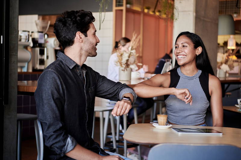 Two people meeting for a networking coffee