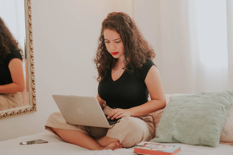 Woman working from home and loving her job