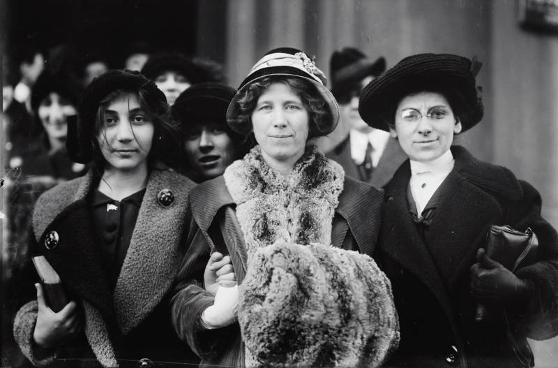 Photograph shows suffrage and labor activist Flora Dodge "Fola" La Follette (1882-1970), social reformer and missionary Rose Livingston, and a young striker during a garment strike in New York City in 1913.