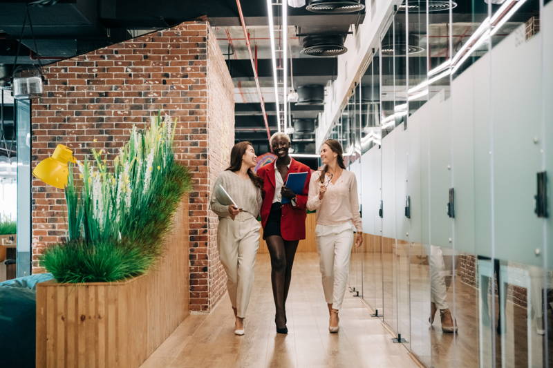women walking in an office